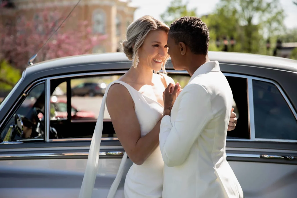 Pepin Mansion in natural wedding photos. Couple in the front lawn next to a vintage Rolls Royce