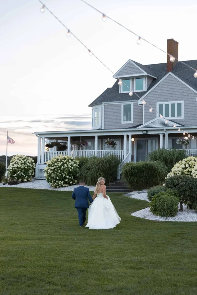 Couple walking towards there reception at Shining Tides | Natural wedding photos